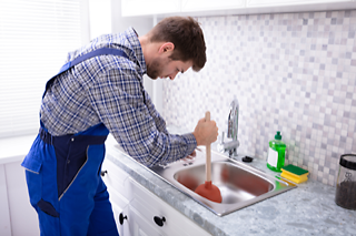 Unclogging Kitchen Drain